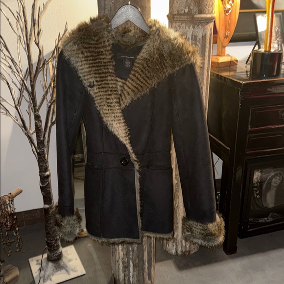 Calvin Klein Jeans Jackets & Blazers - Looks brown in photos but it is black with brown faux fur.